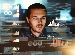 intense-looking data analyst checks his numbers